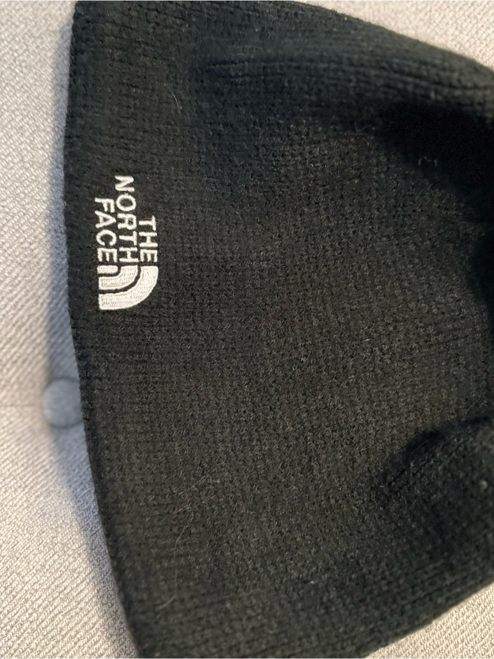 The North Face Black Beanie with White Logo